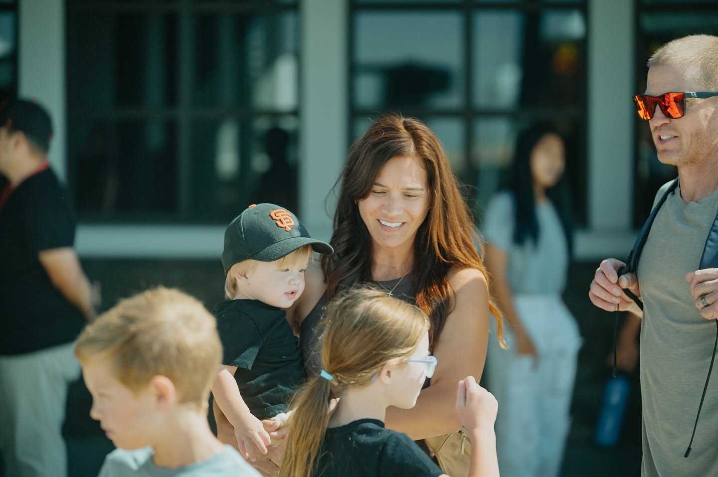 A parent and kids in the lobby