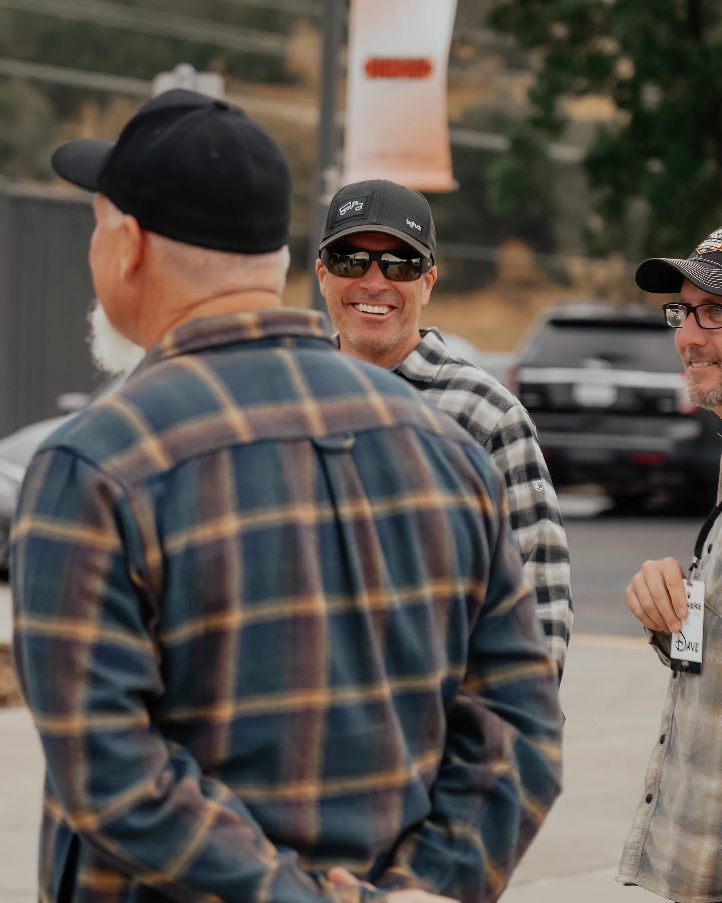 Greeters directing cars in the parking lot